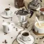 Silver Bialetti Moka Express coffee maker for brewing two cups of espresso. Silver Bialetti Moka Express coffee maker for brewing two cups of espresso.
