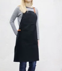 Baristische Schürze schwarz mit Taschen, Seitenansicht Baristische Schürze schwarz mit Taschen, Seitenansicht