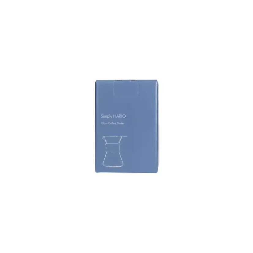 Porte-filtre en verre blanc avec des pièces en acier inoxydable, idéal pour préparer un café de qualité.