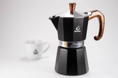 Moka pot with a cup of Spa coffee