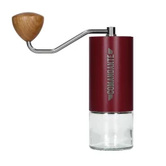 Manual coffee grinder Comandante C40 MK3 Nitro Blade in burgundy color, ideal for precise coffee grinding.