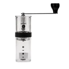 Ručný mlynček na kávu Hario Smart G s priehľadným dizajnom.
