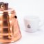 Hario Buono copper teapot and cup with the Spa Coffee logo.