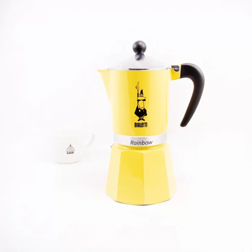 Bialetti Rainbow 6 in yellow with coffee in the background