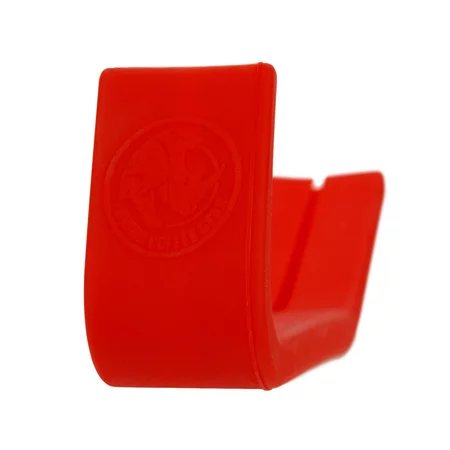 Poignée en silicone rouge conçue pour les cruches à lait d'une capacité de 600 ml.