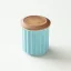 Réserve en céramique pour le café en couleur turquoise. Réserve en céramique pour le café en couleur turquoise.