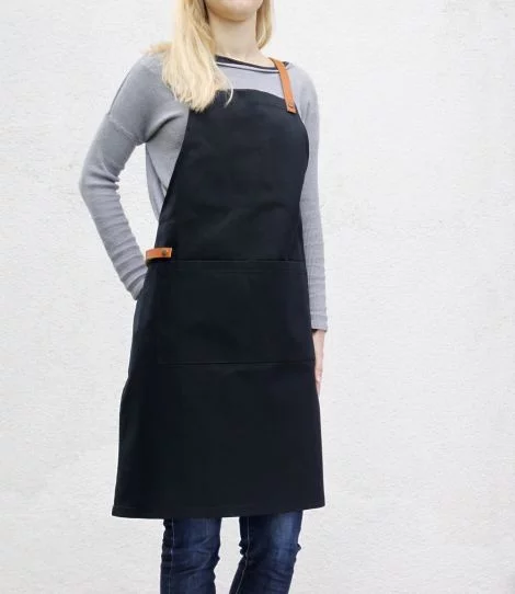 Black barista apron with pockets, side view