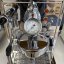 Home lever coffee maker ECM Mechanika V Slim with hot water dispensing feature, ideal for preparing hot beverages.