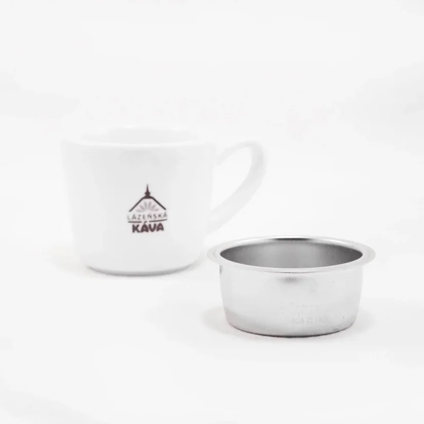 silver IMS basket on a white background with a cup ; Portafilter baskets