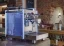 Futuristic design coffee machine with glowing sides.