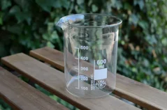 Low glass pitcher with a capacity of 600 ml on an outdoor seating area