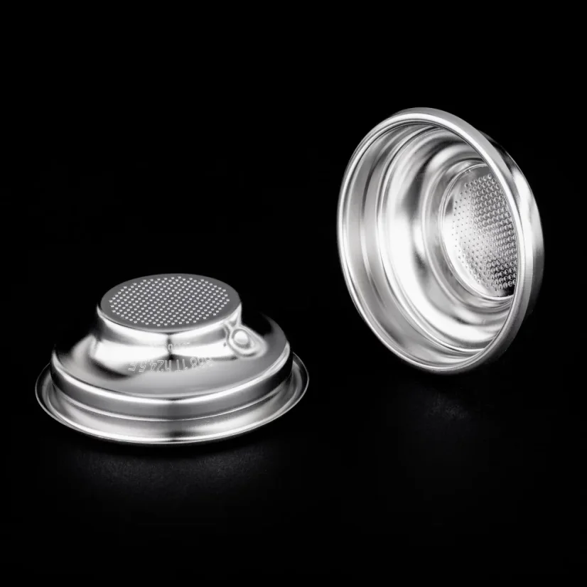 IMS silver baskets on a black background, view of both the inner and outer side of the basket
