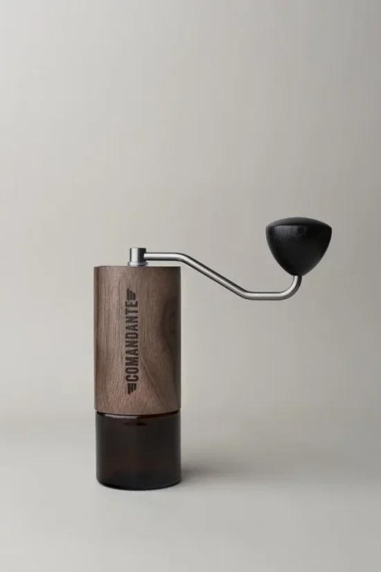 Hand grinder by Comandante in Virginia Walnut color.