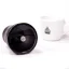Close-up of the top hopper of the Hario Skerton Pro manual coffee grinder, accompanied by a cup.