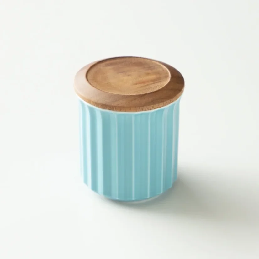 Réserve en céramique pour le café en couleur turquoise.