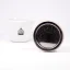 Espresso cup with a logo next to a spare gasket for a Bialetti moka pot. Espresso cup with a logo next to a spare gasket for a Bialetti moka pot.