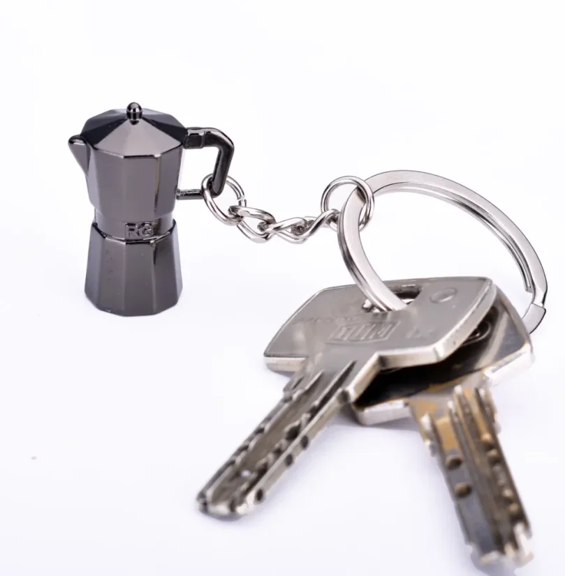 Silver keychain pendant in the shape of a moka pot, an ideal gift for coffee lovers.