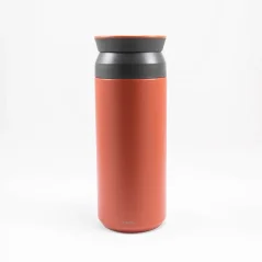 Red stainless steel thermal bottle with a capacity of 500 ml on a white background