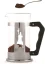 The first step in preparing coffee in a Bialetti French Press, which is pouring in the correctly ground coffee.