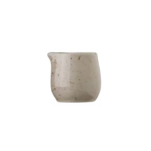 Milk jug for serving milk.