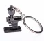 Black coffee grinder - mini keychain.