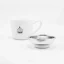IMS silver basket on a white background with a cup; Portafilter baskets IMS silver basket on a white background with a cup; Portafilter baskets