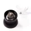 Detail of the grinding stones of the Hario Skerton Pro manual grinder on a white background with a cup of coffee