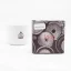IMS basket in original gray box on white background with cup ; Portafilter baskets