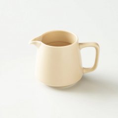 Origami of Coffee server in beige color.