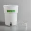 White plastic container for cold macerated cold brew coffee preparation by Toddy, accompanied by a plastic base