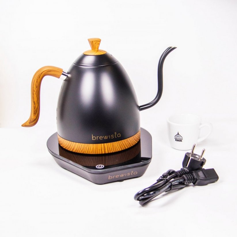 Black matte teapot with gooseneck and wooden details on an electric base that keeps it at temperature.