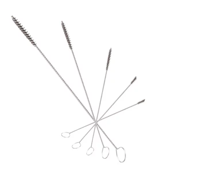 Brosses pour nettoyer la buse à lait.