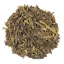 Loose green tea China Sencha on a white background, top view