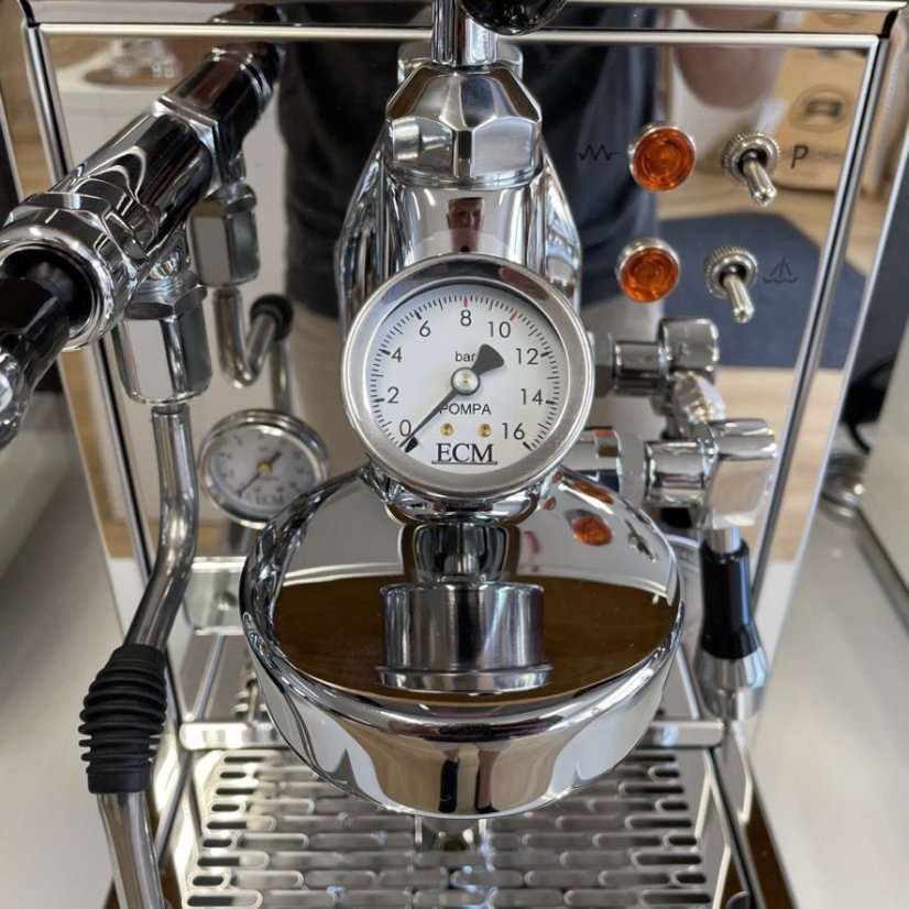 Home lever coffee maker ECM Mechanika V Slim with hot water dispensing feature, ideal for preparing hot beverages.