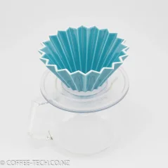 Turquoise Origami dripper on a plastic holder. Turquoise Origami dripper on a plastic holder.