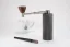 Timemore Nano Grinder with brush and cup of coffee