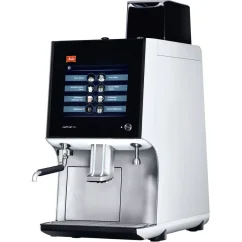 Profesionálny automatický kávovar Melitta Cafina XT8 schopný pripravovať espresso a ďalšie nápoje.