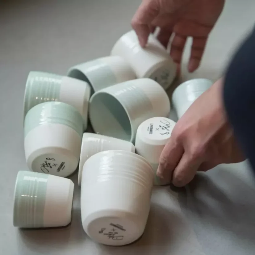 An elegant celadon green flat white mug with a capacity of 150 ml is the perfect accessory for coffee lovers.
