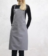 Gray barista apron with pockets, front view Gray barista apron with pockets, front view