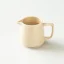 Serveur de café origami en beige. Serveur de café origami en beige.