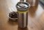 Coffee in a thermos mug of the Wacaco Cuppamoka coffee maker.
