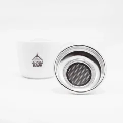 IMS silver basket on a white background with a cup, view of the bottom of the basket. IMS silver basket on a white background with a cup, view of the bottom of the basket.