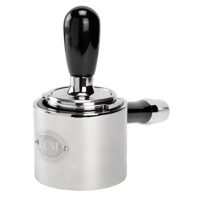 ECM tamper station with a tamper.