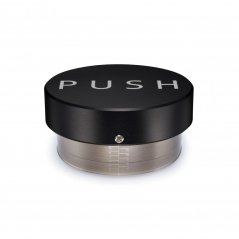 Black push tamper with 58,5 mm base for espresso preparation.