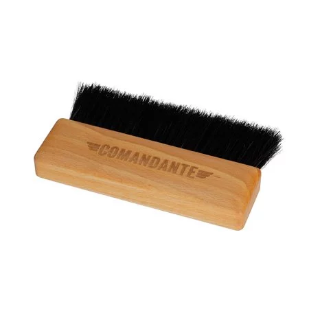 Brush for cleaning the grinder with a wooden handle.