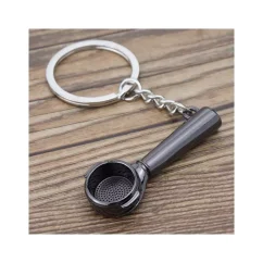 Coffea palanca negra es un llavero elegante de color negro, ideal como regalo para los amantes del café.