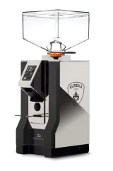 Eureka Mignon Perfetto espresso grinder with a chrome body and Eureka logo.
