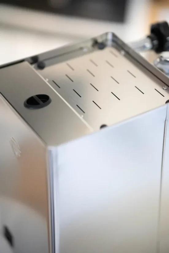 Top view of Lelo Mara lever espresso machine made of stainless steel.