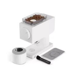 White Fellow Ode Brew electric coffee grinder on a white background, side view