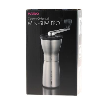 Manual Hario Mini Mill Slim Pro coffee grinder in silver with ceramic grinding stones for precise and even coffee grinding.